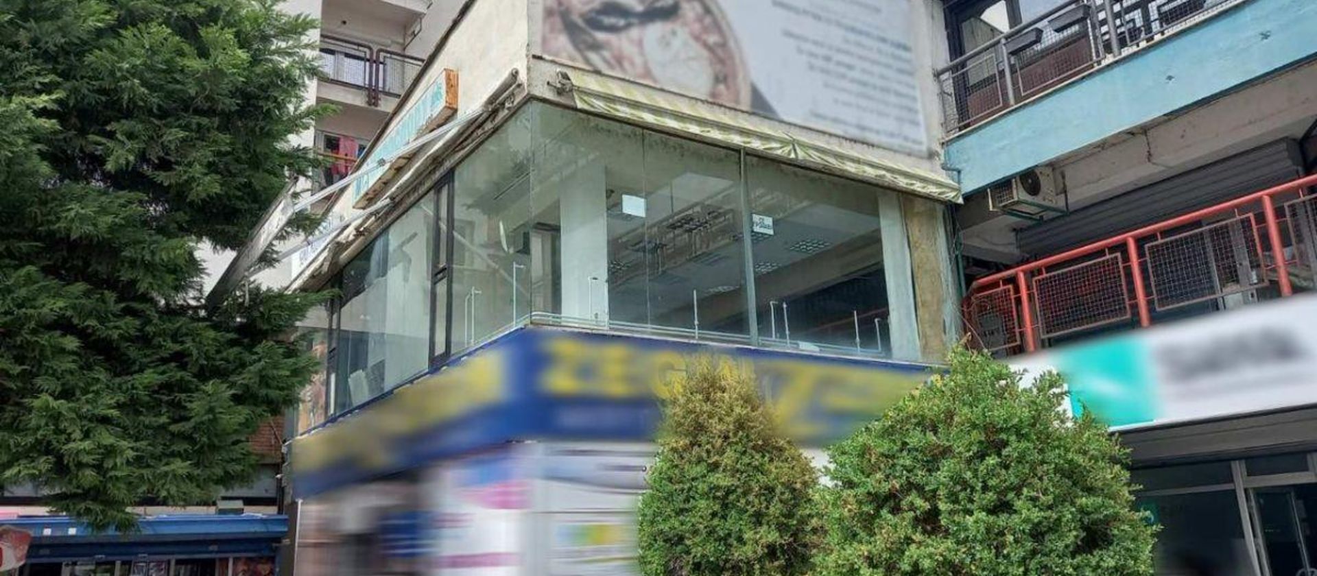 Building, City, Urban, Shop, Shopping-Mall, Advertisement, Bus-Stop, Monastery, Vandalism, High-Rise
