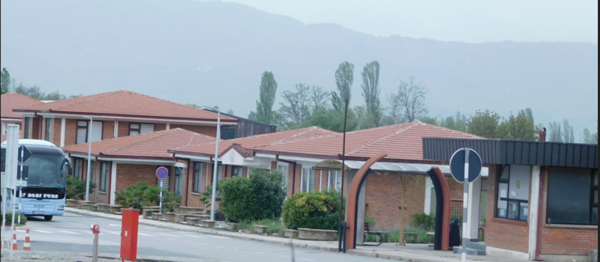 Neighborhood, Housing, City, Bus, Road, House, Roof, Suburb, Bench, Person