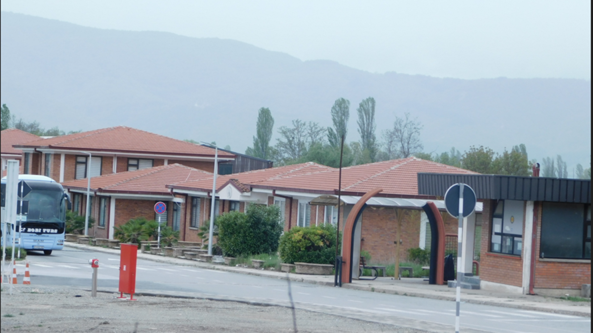 Neighborhood, Housing, City, Bus, Road, House, Roof, Suburb, Bench, Person